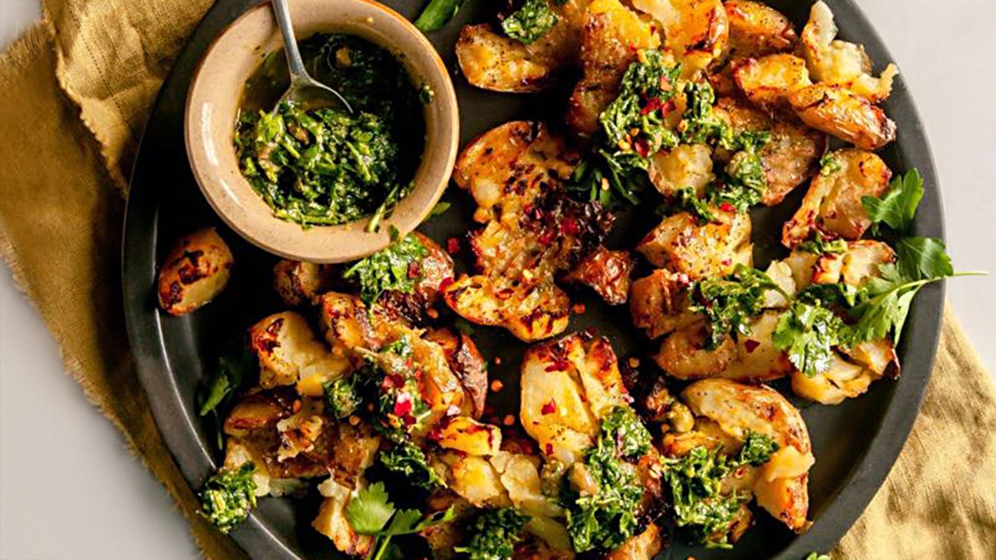 CRISPY SMASHED POTATOES WITH SALSA VERDE STYLE SAUCE