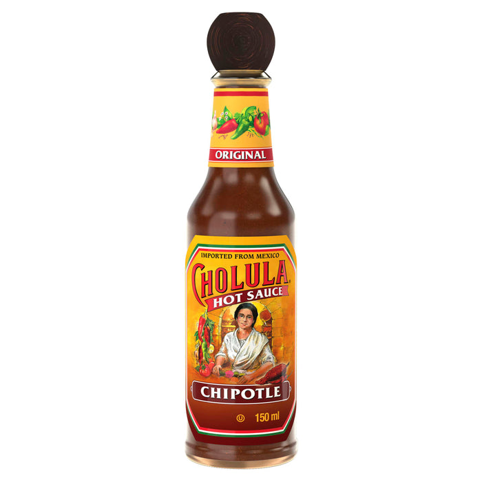 A bottle of Cholula Hot Sauce Chipotle 6 150Ml featuring the iconic wooden cap and a label depicting a woman in a traditional Mexican kitchen.