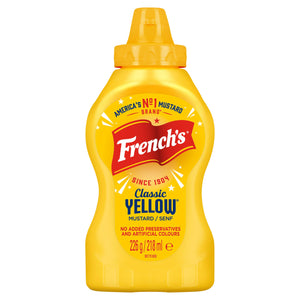 A yellow squeeze bottle of French'S American Classic Yellow Squeezy Mustard 226G, Imported From Britain, is shown against a white background.