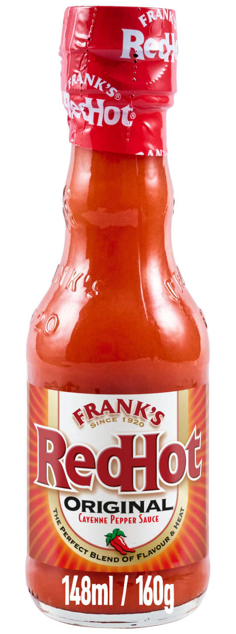 A glass bottle of Franks Rdhot Orig Gb 24/148 Ml, showing the Frank's RedHot Original Cayenne Pepper Sauce label against a white background.
