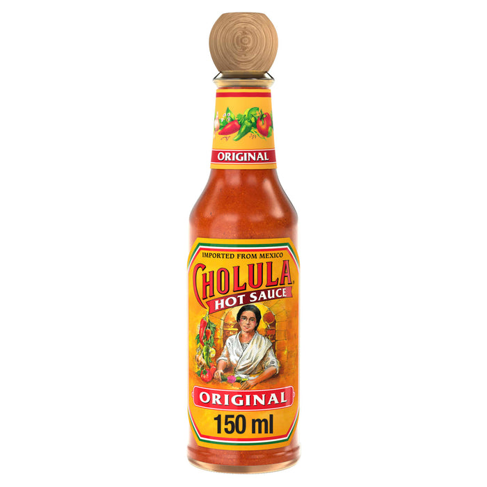 A glass bottle of Cholula Original Mexican Hot Sauce 150Ml is displayed, featuring its distinctive wooden cap and yellow label with an illustration of a woman and peppers.
