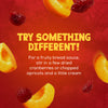 A serving suggestion for Schwartz Luxury Bread Sauce 40G shows how to create a fruity version by adding dried cranberries and chopped apricots, which are pictured falling against a red background.