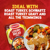 A packet of Schwartz Luxury Bread Sauce 40G is shown next to a plate of roast turkey with gravy and roasted vegetables, illustrating a perfect serving suggestion.