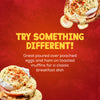 A vibrant red advertisement features two plates of Eggs Benedict, a serving suggestion for Schwartz Hollandaise Sauce Mix 25G, with text that reads, Try something different!