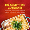 An enticing image of a freshly baked lasagna in a dish suggests trying something different by using Schwartz Extra Mature Cheddar Cheese Sauce 30G to create a flavourful meal.