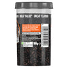 A clear plastic jar of Schwartz Medium Black Peppercorns 100G showing the whole black peppercorns through the container and the product information on the back label.