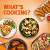 A vibrant food spread featuring a variety of dishes like steak tacos, chicken caesar salad, and potato wedges that could be seasoned using the Spice Rack Engraved Gift Set.