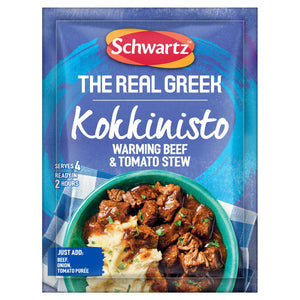 The front of a packet of Schwartz The Real Greek Kokkinisto Warming Beef & Tomato Stew 30G is displayed in front of a serving suggestion of the rich beef and tomato stew served over mashed potatoes in a green bowl.