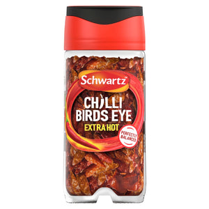 A clear glass jar of Schwartz Birds Eye Chillies 11G filled with whole dried red peppers and featuring a red and black flip top lid.