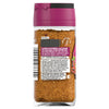 A back view of a glass jar of Schwartz Moroccan Seasoning 40G showing the ingredients list and a mild chili heat level indicator.