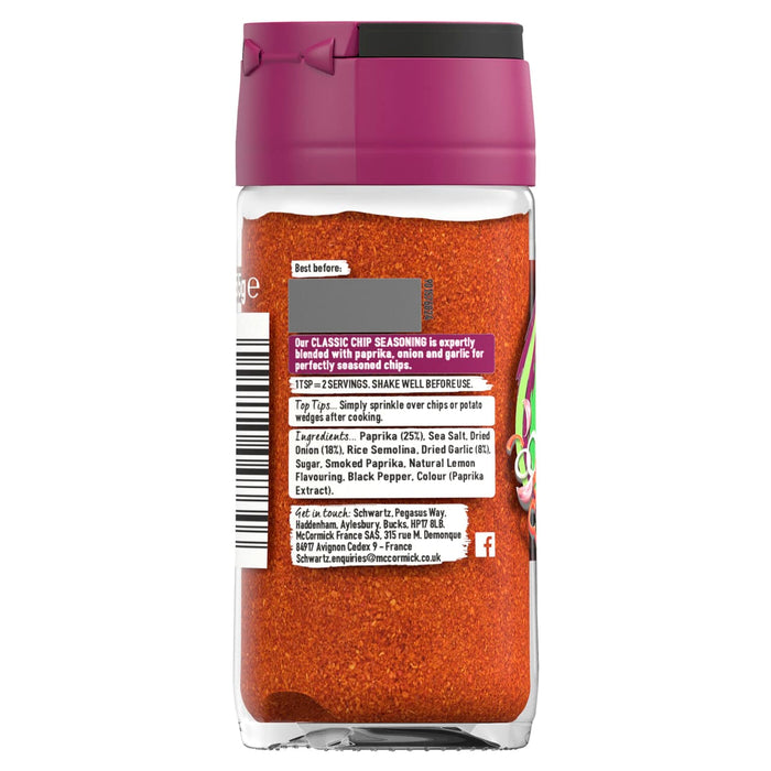 The back label of a bottle of Schwartz Paprika & Onion Classic Chip Seasoning 55G displays the ingredient list including paprika, sea salt, and dried onion along with usage tips for seasoning chips.