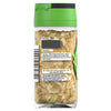 A clear glass jar of Schwartz Lemongrass 6.5G showing the dried herb pieces and back label with cooking tips and contact information.