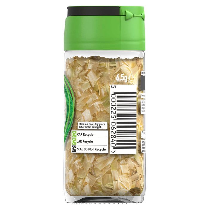 A clear glass jar of Schwartz Lemongrass 6.5G showing the dried herb pieces through the glass and recycling information on the label
