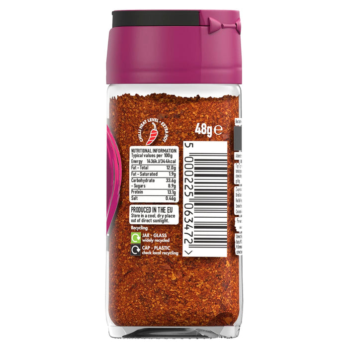 A back view of a glass jar of Schwartz Harissa 48G showing the nutritional information and an extra hot chilli heat level rating.