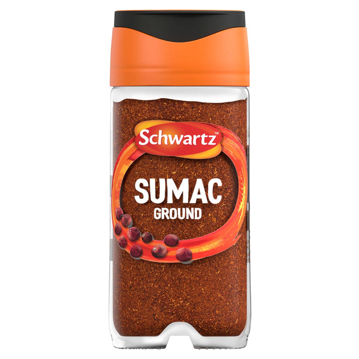 A clear glass jar of Schwartz Sumac Ground 44G featuring a vibrant orange cap and a label showing the deep red spice and whole sumac berries.