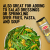 A bottle of Schwartz Jr Lemon Pepper Seas X6 is shown alongside a fresh green bean and orange salad to illustrate that it is also great for adding to salad dressings or sprinkling over fries pasta and soup.