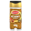A clear Schwartz jar of Jr Hot Honey Seas X6 is filled with a golden-brown seasoning blend, featuring a label with a red chili pepper and a honey dipper.