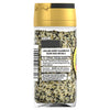 A back-of-jar view of the Schwartz Jr Every Bagel Seas X6, a bold and savoury seasoning with sesame seeds and garlic, displays the ingredients and serving suggestions on the label.