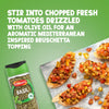 A jar of Schwartz Basil 10G is displayed alongside a serving suggestion for an aromatic Mediterranean inspired bruschetta topping made with chopped fresh tomatoes and olive oil.