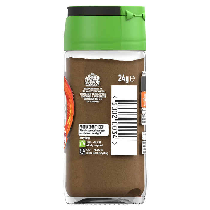 A clear glass jar of Schwartz Ground Coriander 24G features a green cap and a label with recycling information and the Royal Warrant.