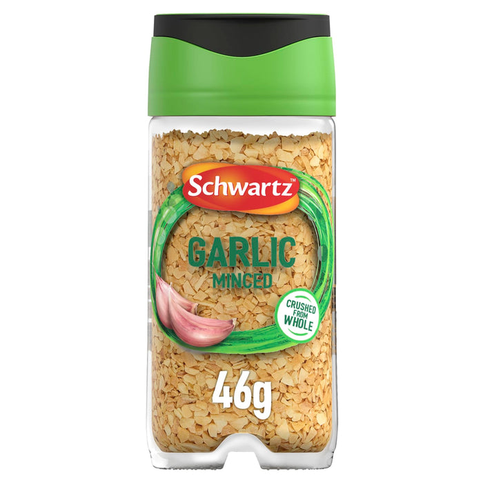A clear glass Schwartz Minced Garlic 46G Jar with a green and black lid filled with dried garlic pieces and featuring a label with two garlic cloves.