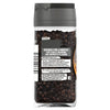A back view of a clear jar containing Schwartz Whole Black Peppercorns showing the product label with usage tips and contact information.