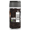 A back view of a 35g glass jar of Schwartz Whole Black Peppercorns showing the barcode and recycling information.