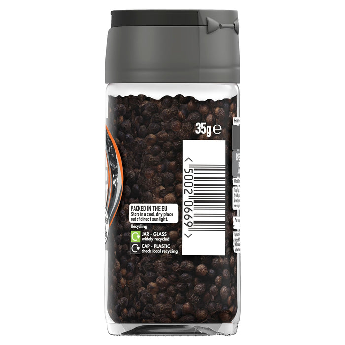 A back view of a 35g glass jar of Schwartz Whole Black Peppercorns showing the barcode and recycling information.