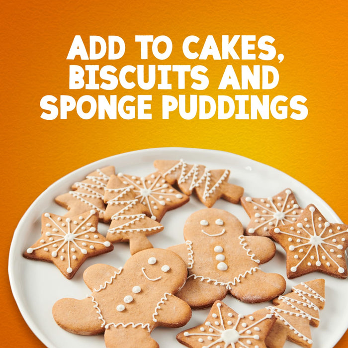 A plate of festive gingerbread cookies decorated with white icing illustrates how to use Schwartz Ground Ginger 26G Jar in your holiday baking.