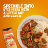 A bottle of Schwartz Ground Ginger 26G Jar is shown next to a plate of beef and pepper stir fry with rice to suggest sprinkling it into dishes with soy and garlic.