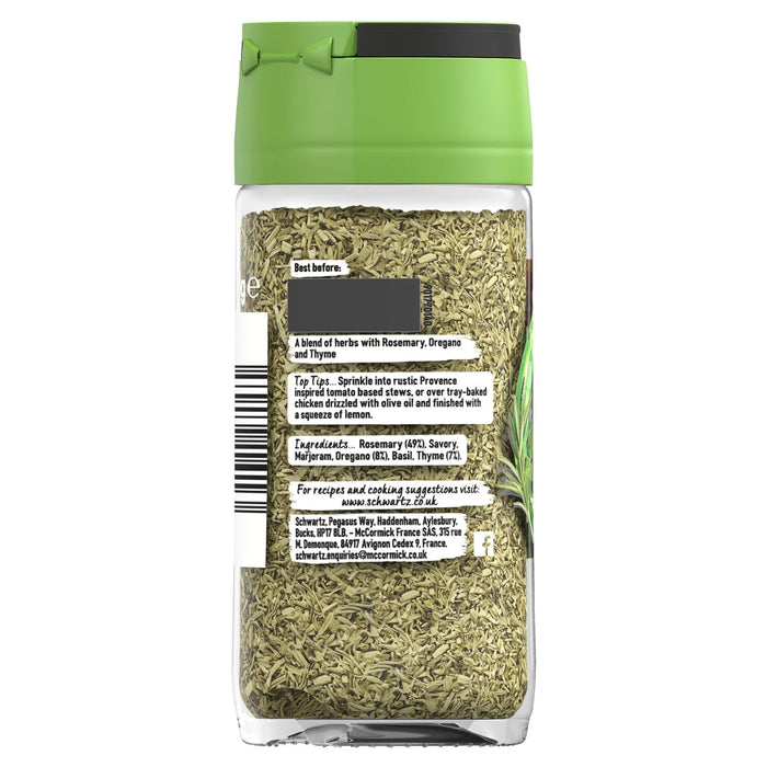 A clear glass jar of Schwartz Herbes De Provence, 11G shows a blend of dried herbs including rosemary, savory, marjoram, oregano, basil, and thyme through the back label.