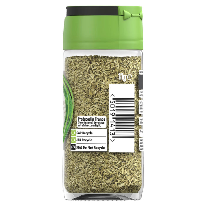 A clear glass jar of Schwartz Herbes De Provence, 11G shows the dried green herb blend through the side of the container which features recycling instructions and a barcode.
