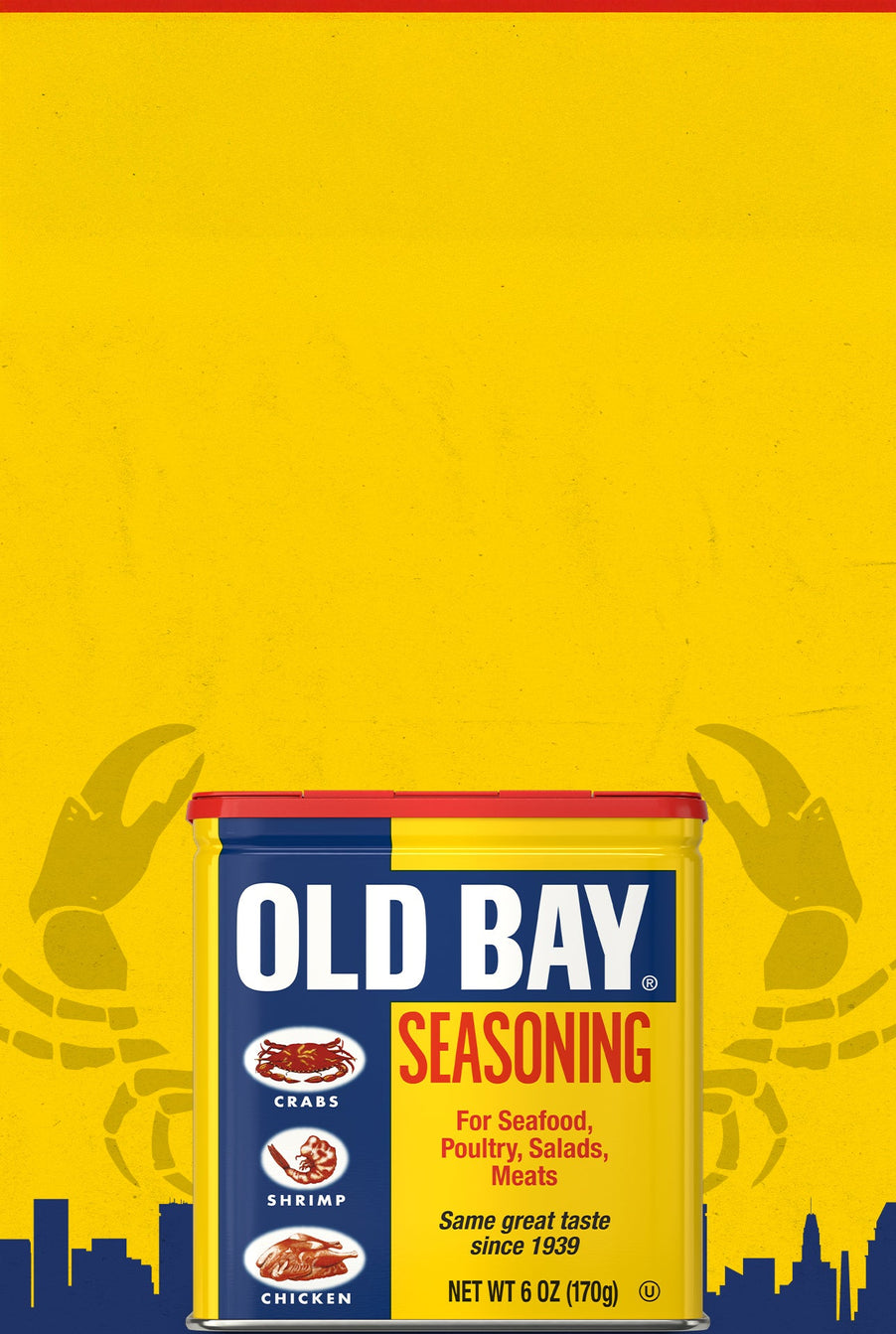 Old Bay seasoning can on a yellow background with crab illustrations